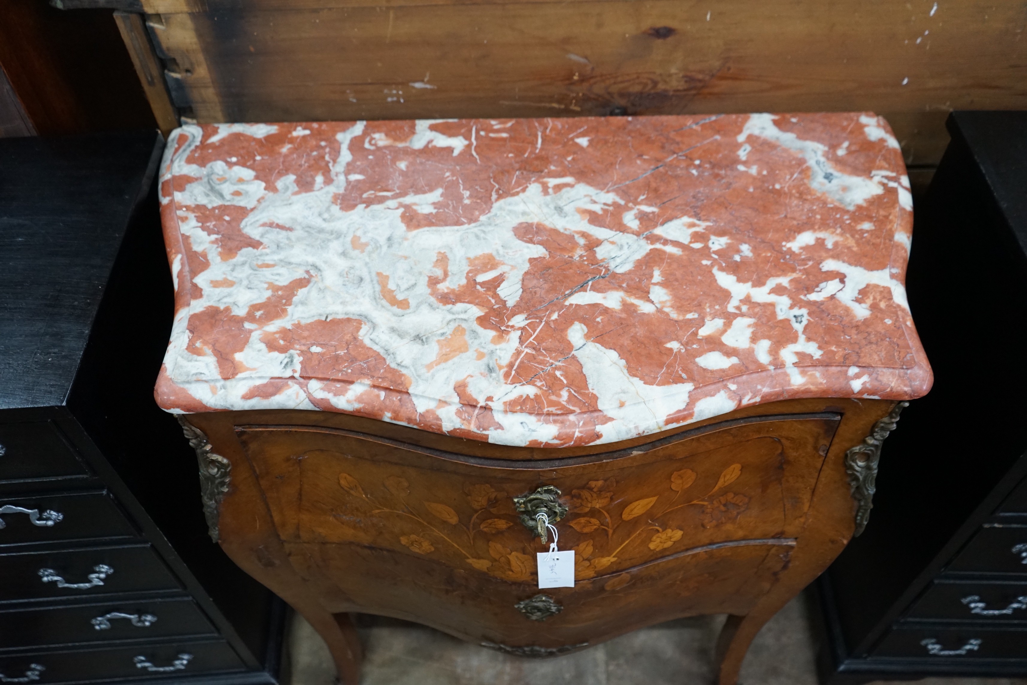 A Louis XVI style marquetry inlaid gilt metal mounted marble top bombe commode, width 83cm, depth 44cm, height 84cm